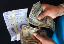 La moneda de Venezuela cae un 5,8 % frente al dólar en el mercado oficial en agosto